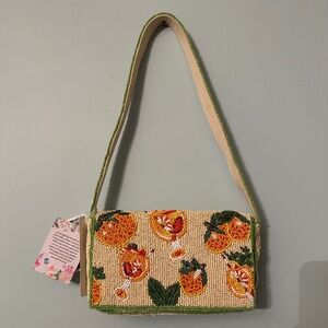 Sold. Orange spritz beaded bag